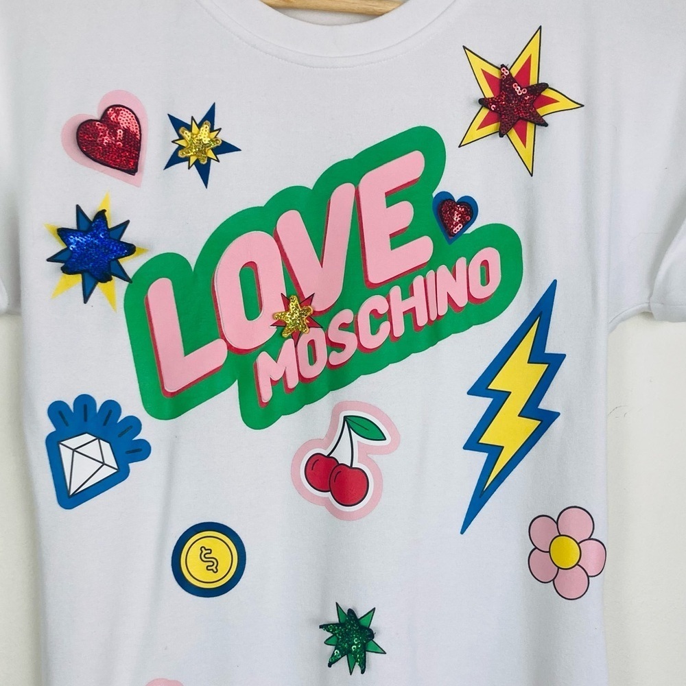 Love Moschino white t-shirt mini length logo dress with sequin appliqués. Size 2 - Picture 3 of 7